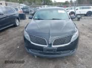 ✅ 2014 Lincoln MKS • VIN: 1LNHL9EK0EG601444 • Lot: 41849160. Listed on IAAI with 164,791 mi. Free auction sales archive from the USA and detailed vehicle history report at DreamBid. Image 12.