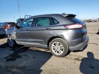 ✅ 2015 Ford Edge SEL • VIN: 2FMTK4J95FBB15515 • Лот: 82780345. Опубликован ранее на Copart с пробегом 101 701 миль. Бесплатный доступ к архиву аукционных продаж из США и подробный отчёт об истории автомобиля на DreamBid. Изображение 2.