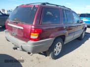 ✅ 2000 Jeep Grand Cherokee Laredo • VIN: 1J4G248S6YC391388 • Lot: 43577527. Listed on IAAI with 182,682 mi. Free auction sales archive from the USA and detailed vehicle history report at DreamBid. Image 4.