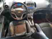 2012 Chevrolet Sonic LTZ с VIN 1G1JE5SH8C4166195, выставлен на аукционе Copart как лот 68735044 с пробегом 176 558 миль миль и Списание • Salvage title. История ставок и продаж доступна на DreamBid. Изображение 8.