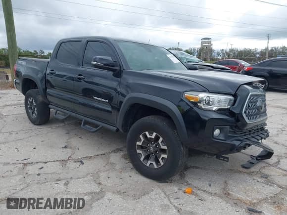 ✅ 2019 Toyota Tacoma SR5 • VIN: 3TMAZ5CN9KM106056 • Lot: 41553403. Listed on IAAI with 92,641 mi. Free auction sales archive from the USA and detailed vehicle history report at DreamBid. Image 1.