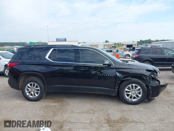 ✅ 2020 Chevrolet Traverse LT Cloth • VIN: 1GNERGKW7LJ294492 • Lot: 43209730. Wystawiony na IAAI z przebiegiem 81 921 mil. Bezpłatny archiwum sprzedaży aukcyjnych z USA i szczegółowy raport historii pojazdu na DreamBid. Zdjęcie 13.