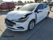 ✅ 2018 Chevrolet Cruze LT • VIN: 1G1BE5SM3J7199215 • Lot: 64859662. Listed on Copart with 113,424 mi. Free auction sales archive from the USA and detailed vehicle history report at DreamBid. Image 2.