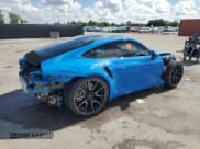 ✅ 2023 Porsche 911 Turbo • VIN: WP0AD2A97PS258306 • Lot: 61753825. Listed on Copart with 2,879 mi. Free auction sales archive from the USA and detailed vehicle history report at DreamBid. Image 3.