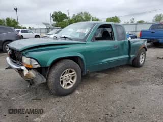 2004 Dodge Dakota SLT with VIN 1D7GL42K04S612274, listed as a Copart auction lot 57443075 with 258,513 mi miles and Salvage title. Bid and sale history available at DreamBid. Image 1.