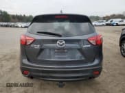 ✅ 2016 Mazda CX-5 Touring • VIN: JM3KE4CYXG0787043 • Lot: 90972585. Wystawiony na Copart z przebiegiem 99 074 mil. Bezpłatny archiwum sprzedaży aukcyjnych z USA i szczegółowy raport historii pojazdu na DreamBid. Zdjęcie 6.