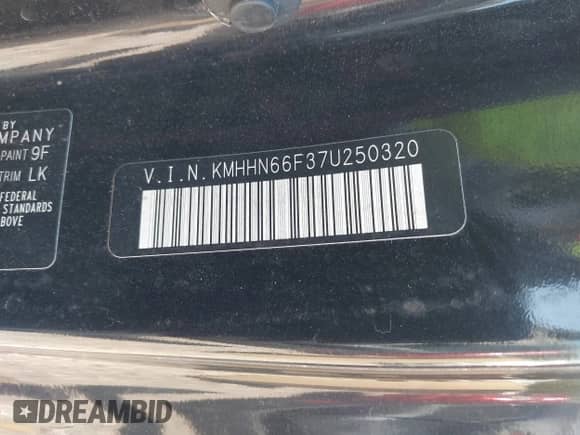 2007 Hyundai Tiburon GT z VIN KMHHN66F37U250320, wystawiony jako IAAI lot #42047654 z przebiegiem 231 899 mil mil oraz . Historia ofert i sprzedaży dostępna na DreamBid. Obrazek 9.