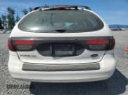 ✅ 2002 Ford Taurus • VIN: 1FAFP59U72A191542 • Лот: 64275705. Опубликован ранее на Copart с пробегом 165 421 миль. Бесплатный доступ к архиву аукционных продаж из США и подробный отчёт об истории автомобиля на DreamBid. Изображение 6.