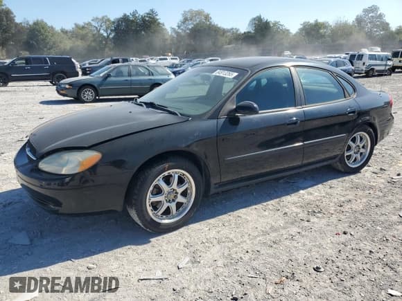 ✅ 2003 Ford Taurus SE Standard • VIN: 1FAFP53U93G179724 • Lot: 84913265. Wystawiony na Copart z przebiegiem 92 731 mil. Bezpłatny archiwum sprzedaży aukcyjnych z USA i szczegółowy raport historii pojazdu na DreamBid. Zdjęcie 1.