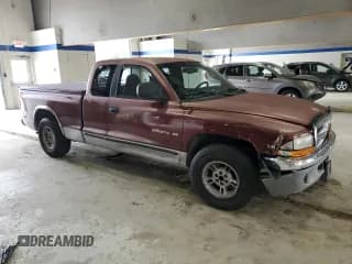 ✅ 2000 Dodge Dakota • VIN: 1B7GL22X9YS639960 • Lot: 68003514. Wystawiony na Copart z przebiegiem 136 725 mil. Bezpłatny archiwum sprzedaży aukcyjnych z USA i szczegółowy raport historii pojazdu na DreamBid. Zdjęcie 4.