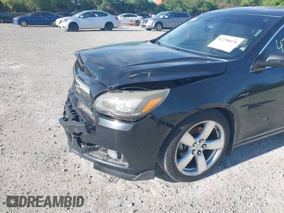 2013 Chevrolet Malibu LTZ with VIN 1G11J5SX7DF248296, listed as a IAAI auction lot 42298476 with 125,337 mi miles and . Bid and sale history available at DreamBid. Image 12.