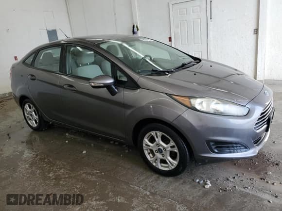 ✅ 2014 Ford Fiesta SE • VIN: 3FADP4BJ0EM116917 • Lot: 93207285. Wystawiony na Copart z przebiegiem 96 183 mil. Bezpłatny archiwum sprzedaży aukcyjnych z USA i szczegółowy raport historii pojazdu na DreamBid. Zdjęcie 4.