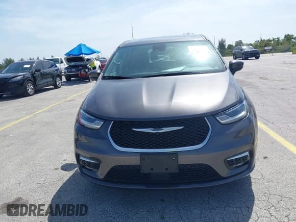 ✅ 2023 Chrysler Pacifica Hybrid Touring L • VIN: 2C4RC1L72PR541015 • Lot: 43084544. Listed on IAAI with 77,848 mi. Free auction sales archive from the USA and detailed vehicle history report at DreamBid. Image 12.