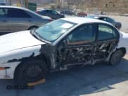 ✅ 2002 Saturn SL • VIN: 1G8ZH52802Z154555 • Lot: 42771346. Listed on IAAI with 248,496 mi. Free auction sales archive from the USA and detailed vehicle history report at DreamBid. Image 6.