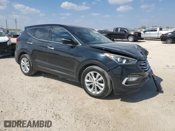 ✅ 2018 Hyundai Santa Fe 2.0T • VIN: 5XYZU4LAXJG548963 • Лот: 82633375. Опубликован ранее на Copart с пробегом 95 041 миль. Бесплатный доступ к архиву аукционных продаж из США и подробный отчёт об истории автомобиля на DreamBid. Изображение 4.