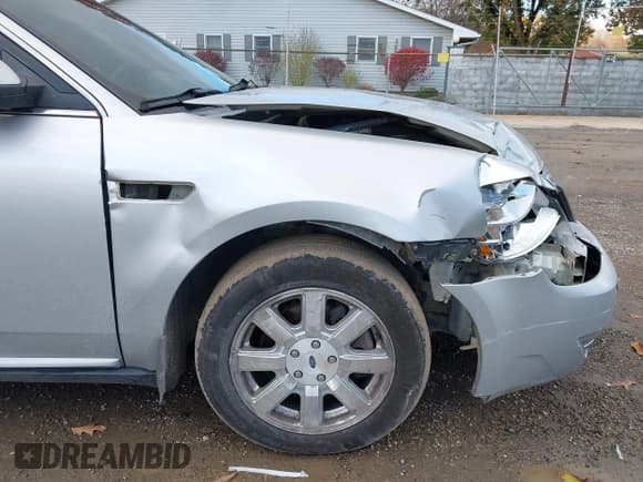 ✅ 2009 Ford Taurus SE • VIN: 1FAHP23WX9G119677 • Lot: 43664490. Listed on IAAI with 204,885 mi. Free auction sales archive from the USA and detailed vehicle history report at DreamBid. Image 18.