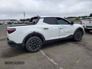 2022 Hyundai Santa Cruz SEL z VIN 5NTJBDAE9NH009503, wystawiony jako Copart lot #64002324 z przebiegiem 60 043 mil mil oraz Szkoda całkowita • Salvage title. Historia ofert i sprzedaży dostępna na DreamBid. Obrazek 3.