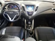 ✅ 2014 Hyundai Veloster • VIN: KMHTC6AD3EU201220 • Lot: 41369803. Wystawiony na Copart z przebiegiem 108 638 mil. Bezpłatny archiwum sprzedaży aukcyjnych z USA i szczegółowy raport historii pojazdu na DreamBid. Zdjęcie 8.