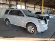 ✅ 2011 Mercury Mariner • VIN: 4M2CN8B73BKJ04913 • Lot: 88345615. Listed on Copart with 215,124 mi. Free auction sales archive from the USA and detailed vehicle history report at DreamBid. Image 4.