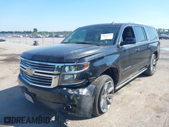 ✅ 2015 Chevrolet Suburban LTZ • VIN: 1GNSKKKC6FR234435 • Lot: 43245135. Listed on IAAI with 189,693 mi. Free auction sales archive from the USA and detailed vehicle history report at DreamBid. Image 17.