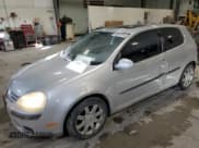 ✅ 2009 Volkswagen Rabbit S • VIN: WVWBB71K29W003438 • Lot: 46041015. Listed on Copart with 128,351 mi. Free auction sales archive from the USA and detailed vehicle history report at DreamBid. Image 1.