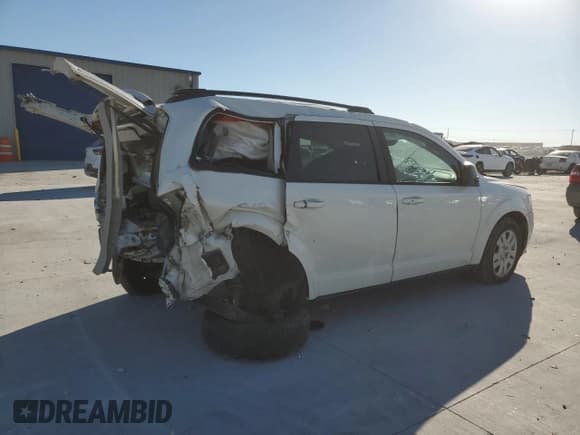 ✅ 2016 Dodge Journey SE • VIN: 3C4PDCABXGT166138 • Lot: 86498725. Listed on Copart with 126,852 mi. Free auction sales archive from the USA and detailed vehicle history report at DreamBid. Image 3.