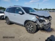 ✅ 2022 Honda Pilot Touring 7-Passenger • VIN: 5FNYF6H63NB077922 • Lot: 69424205. Listed on Copart with 32,813 mi. Free auction sales archive from the USA and detailed vehicle history report at DreamBid. Image 4.