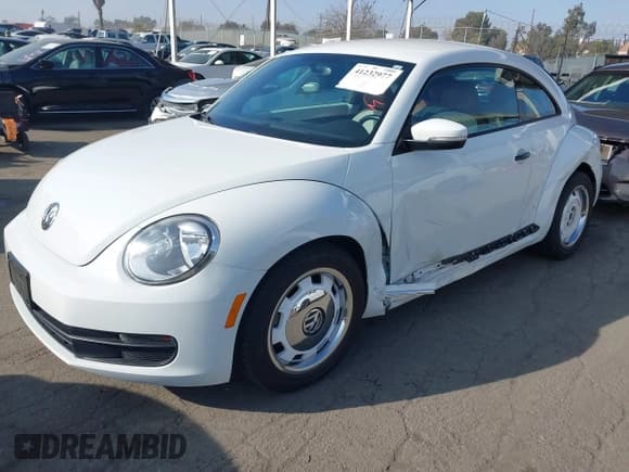 ✅ 2015 Volkswagen Beetle Fleet Edition • VIN: 3VWF17AT0FM607009 • Lot: 41232977. Listed on IAAI with 92,531 mi. Free auction sales archive from the USA and detailed vehicle history report at DreamBid. Image 2.