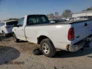 ✅ 2002 Ford F-150 XL • VIN: 2FTRF17W72CA39637 • Lot: 76827724. Wystawiony na Copart z przebiegiem Nie podano. Bezpłatny archiwum sprzedaży aukcyjnych z USA i szczegółowy raport historii pojazdu na DreamBid. Zdjęcie 2.
