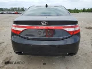 ✅ 2013 Hyundai Azera • VIN: KMHFH4JG5DA316804 • Лот: 57532975. Опубликован ранее на Copart с пробегом 243 038 миль. Бесплатный доступ к архиву аукционных продаж из США и подробный отчёт об истории автомобиля на DreamBid. Изображение 6.