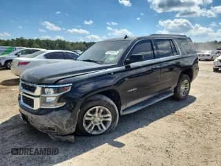 2015 Chevrolet Tahoe LT with VIN 1GNSKBKC0FR166813, listed as a Copart auction lot 82104075 with 284,782 mi miles and Salvage title. Bid and sale history available at DreamBid. Image 1.