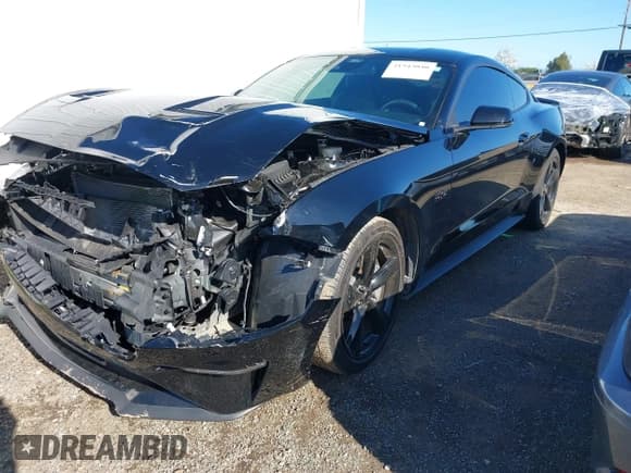 ✅ 2023 Ford Mustang GT • VIN: 1FA6P8CF6P5302934 • Lot: 41943040. Listed on IAAI with 23,158 mi. Free auction sales archive from the USA and detailed vehicle history report at DreamBid. Image 2.