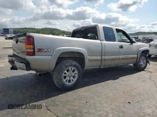 2001 Chevrolet Silverado 1500 LS z VIN 1GCEK19T41Z189543, wystawiony jako Copart lot #62922784 z przebiegiem 157 821 mil mil oraz Szkoda całkowita • Salvage title. Historia ofert i sprzedaży dostępna na DreamBid. Obrazek 3.