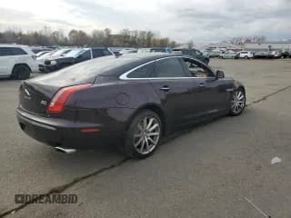 ✅ 2014 Jaguar XJ • VIN: SAJWJ1CD4E8V60190 • Lot: 90876975. Wystawiony na Copart z przebiegiem Nie podano. Bezpłatny archiwum sprzedaży aukcyjnych z USA i szczegółowy raport historii pojazdu na DreamBid. Zdjęcie 3.