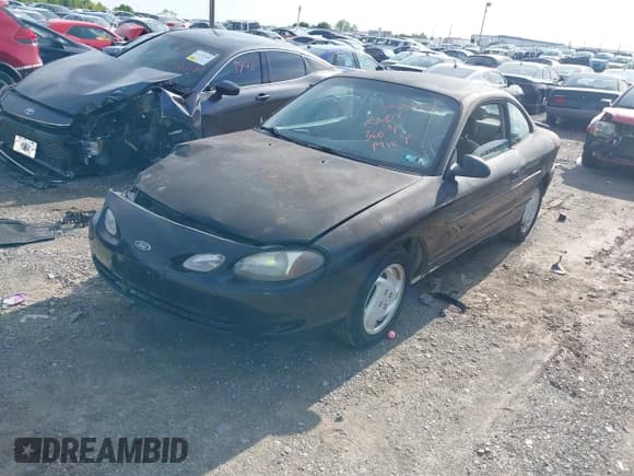 ✅ 2000 Ford Escort ZX2 • VIN: 3FAKP1139YR235632 • Lot: 42240451. Listed on IAAI with 139,532 mi. Free auction sales archive from the USA and detailed vehicle history report at DreamBid. Image 2.