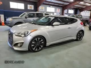 ✅ 2015 Hyundai Veloster Turbo • VIN: KMHTC6AEXFU216307 • Lot: 75203904. Wystawiony na Copart z przebiegiem 151 814 mil. Bezpłatny archiwum sprzedaży aukcyjnych z USA i szczegółowy raport historii pojazdu na DreamBid. Zdjęcie 1.