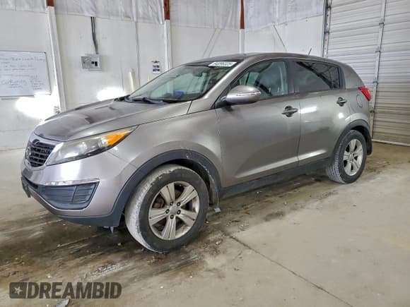 ✅ 2012 Kia Sportage LX • VIN: KNDPB3A26C7198136 • Lot: 94096325. Listed on Copart with 181,614 mi. Free auction sales archive from the USA and detailed vehicle history report at DreamBid. Image 1.