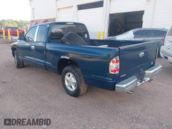 1997 Dodge Dakota z VIN 1B7GL23YXVS253793, wystawiony jako IAAI lot #43225760 z przebiegiem 351 958 mil mil oraz . Historia ofert i sprzedaży dostępna na DreamBid. Obrazek 3.