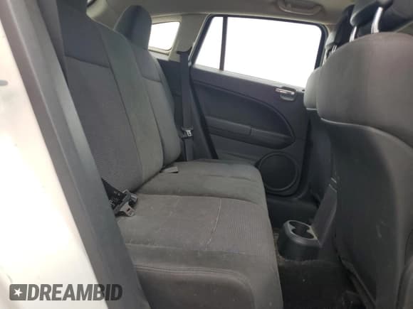 ✅ 2011 Dodge Caliber Heat • VIN: 1B3CB5HA2BD156183 • Лот: 68870584. Опубликован ранее на Copart с пробегом 159 506 миль. Бесплатный доступ к архиву аукционных продаж из США и подробный отчёт об истории автомобиля на DreamBid. Изображение 10.