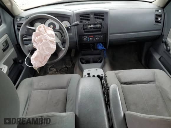 2006 Dodge Dakota ST z VIN 1D7HE28K66S509857, wystawiony jako Copart lot #63910594 z przebiegiem 216 921 mil mil oraz Szkoda całkowita • Salvage title. Historia ofert i sprzedaży dostępna na DreamBid. Obrazek 8.