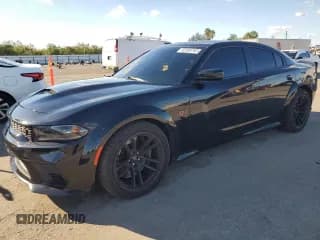 ✅ 2023 Dodge Charger Scat Pack • VIN: 2C3CDXGJ3PH523418 • Лот: 82505765. Опубликован ранее на Copart с пробегом 20 560 миль. Бесплатный доступ к архиву аукционных продаж из США и подробный отчёт об истории автомобиля на DreamBid. Изображение 1.