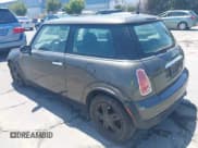 ✅ 2006 MINI Hardtop • VIN: WMWRC33516TJ78883 • Lot: 42955673. Listed on IAAI with 91,920 mi. Free auction sales archive from the USA and detailed vehicle history report at DreamBid. Image 3.