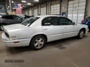 ✅ 1999 Buick Park Avenue Ultra • VIN: 1G4CU5213X4649052 • Lot: 72684084. Wystawiony na Copart z przebiegiem Nie podano. Bezpłatny archiwum sprzedaży aukcyjnych z USA i szczegółowy raport historii pojazdu na DreamBid. Zdjęcie 3.