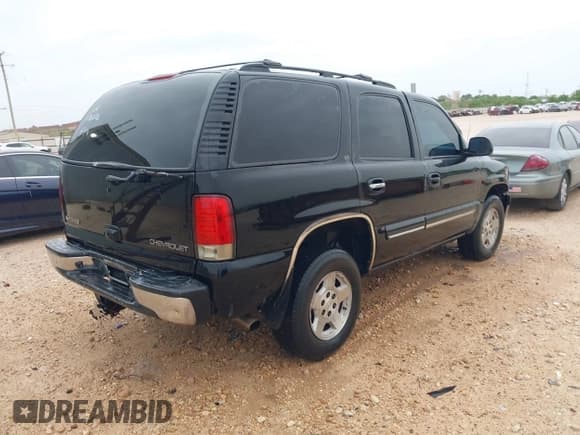 ✅ 2002 Chevrolet Tahoe LT • VIN: 1GNEC13Z72R176028 • Lot: 41897050. Listed on IAAI with 216,553 mi. Free auction sales archive from the USA and detailed vehicle history report at DreamBid. Image 4.