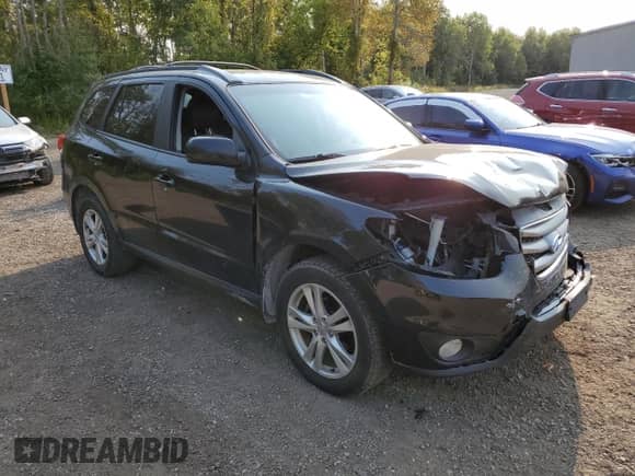 2012 Hyundai Santa Fe GLS с VIN 5XYZGDAG8CG151527, выставлен на аукционе Copart как лот 70449004 с пробегом 287 635 миль миль и Списание • Salvage title. История ставок и продаж доступна на DreamBid. Изображение 4.