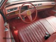 ✅ 1974 Cadillac Eldorado • VIN: MVIN327905IND • Lot: 61442155. Listed on Copart with 4,947 mi. Free auction sales archive from the USA and detailed vehicle history report at DreamBid. Image 8.