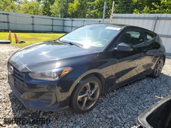 2020 Hyundai Veloster Premium z VIN KMHTG6AFXLU026578, wystawiony jako Copart lot #65702215 z przebiegiem 81 659 mil mil oraz Szkoda całkowita • Salvage title. Historia ofert i sprzedaży dostępna na DreamBid. Obrazek 1.