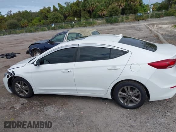 ✅ 2018 Hyundai Elantra SEL • VIN: 5NPD84LF4JH367277 • Lot: 43523338. Listed on IAAI with 129,486 mi. Free auction sales archive from the USA and detailed vehicle history report at DreamBid. Image 14.