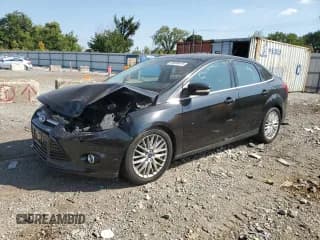 ✅ 2014 Ford Focus Titanium • VIN: 1FADP3J25EL222625 • Lot: 80809675. Listed on Copart with Not provided. Free auction sales archive from the USA and detailed vehicle history report at DreamBid. Image 1.