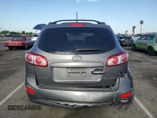 2010 Hyundai Santa Fe GLS with VIN 5NMSG3AB6AH379299, listed as a Copart auction lot 65987014 with 134,917 mi miles and Salvage title. Bid and sale history available at DreamBid. Image 6.